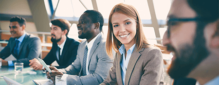 Professional people sitting around table