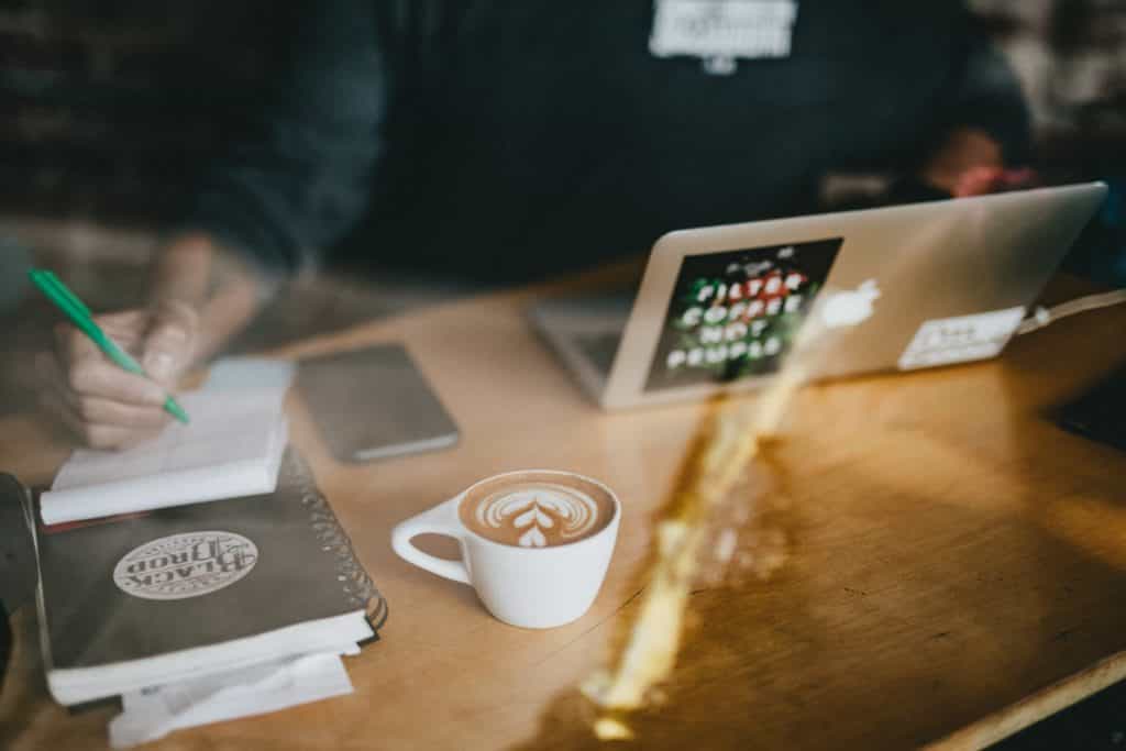 Desk with coffee and laptop